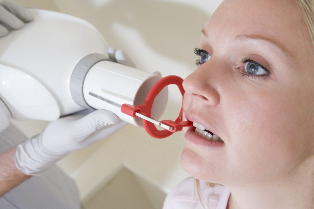 Woman having a dental xray