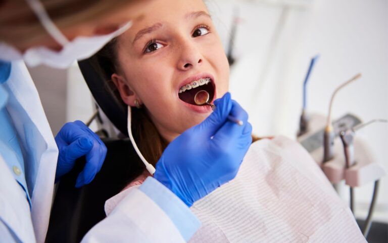 Child at Dentist Recieving Checkup
