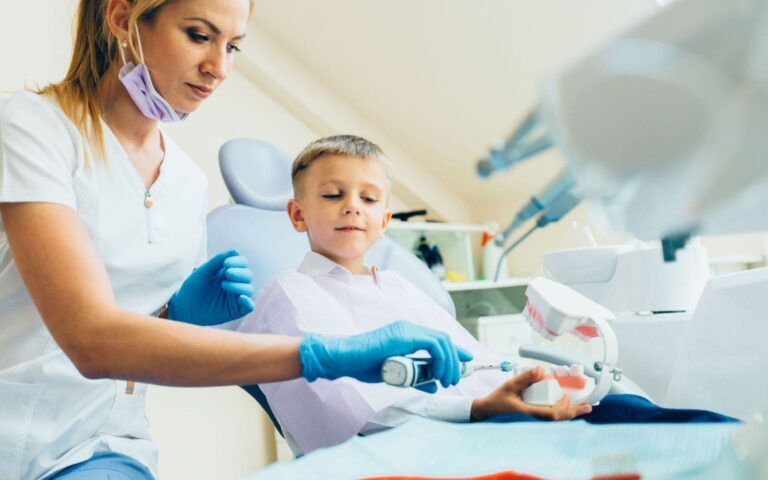 Child receiving an early orthodontic exam