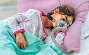 Child with sleep apnea